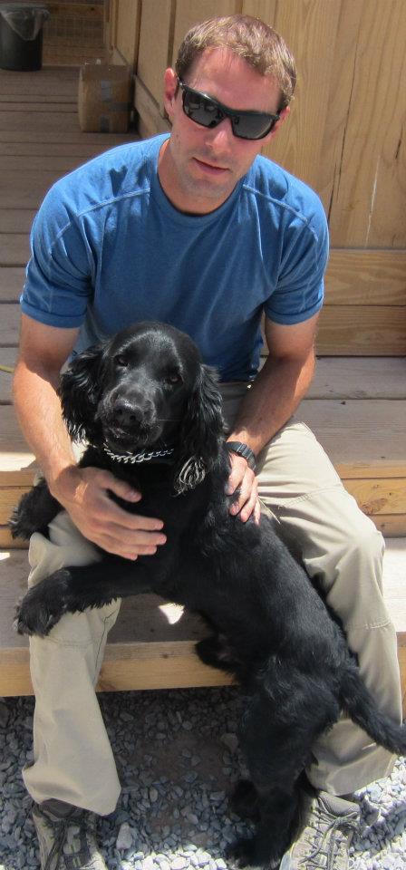 SSG. Nevins and Rocky, the bomb sniffing dog.